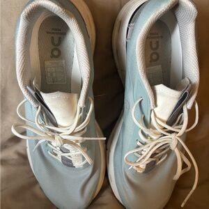 On Running White and Gray Sneakers